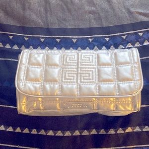 GIVENCHY COUTURE SILVER CLUTCH. 100% Authentic. New Never Used.